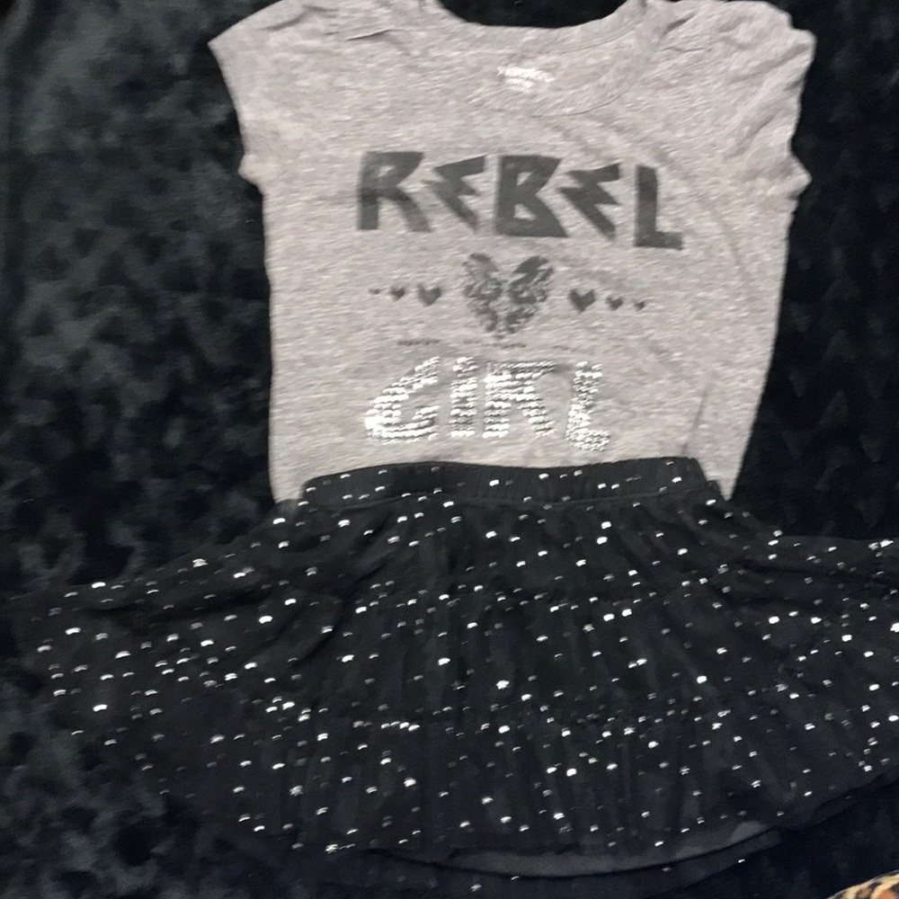 Tutu with silver metallic stars and spots.